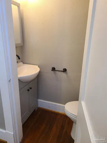 a bathroom with a sink and toilet