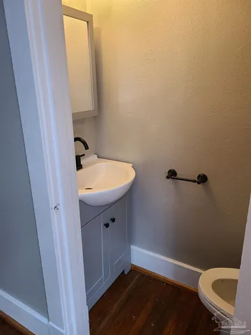 a bathroom with a sink and a toilet