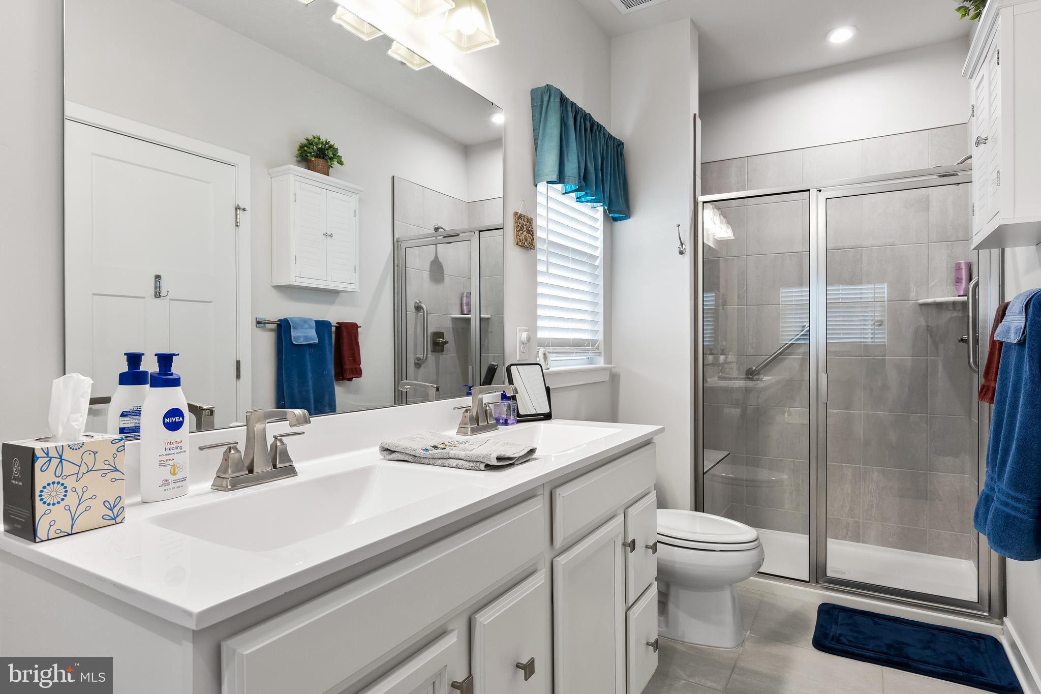 11 Cinnamon Lane Mount Laurel, NJ 08054 - Photo 12 of 17 a bathroom with a sink toilet and shower