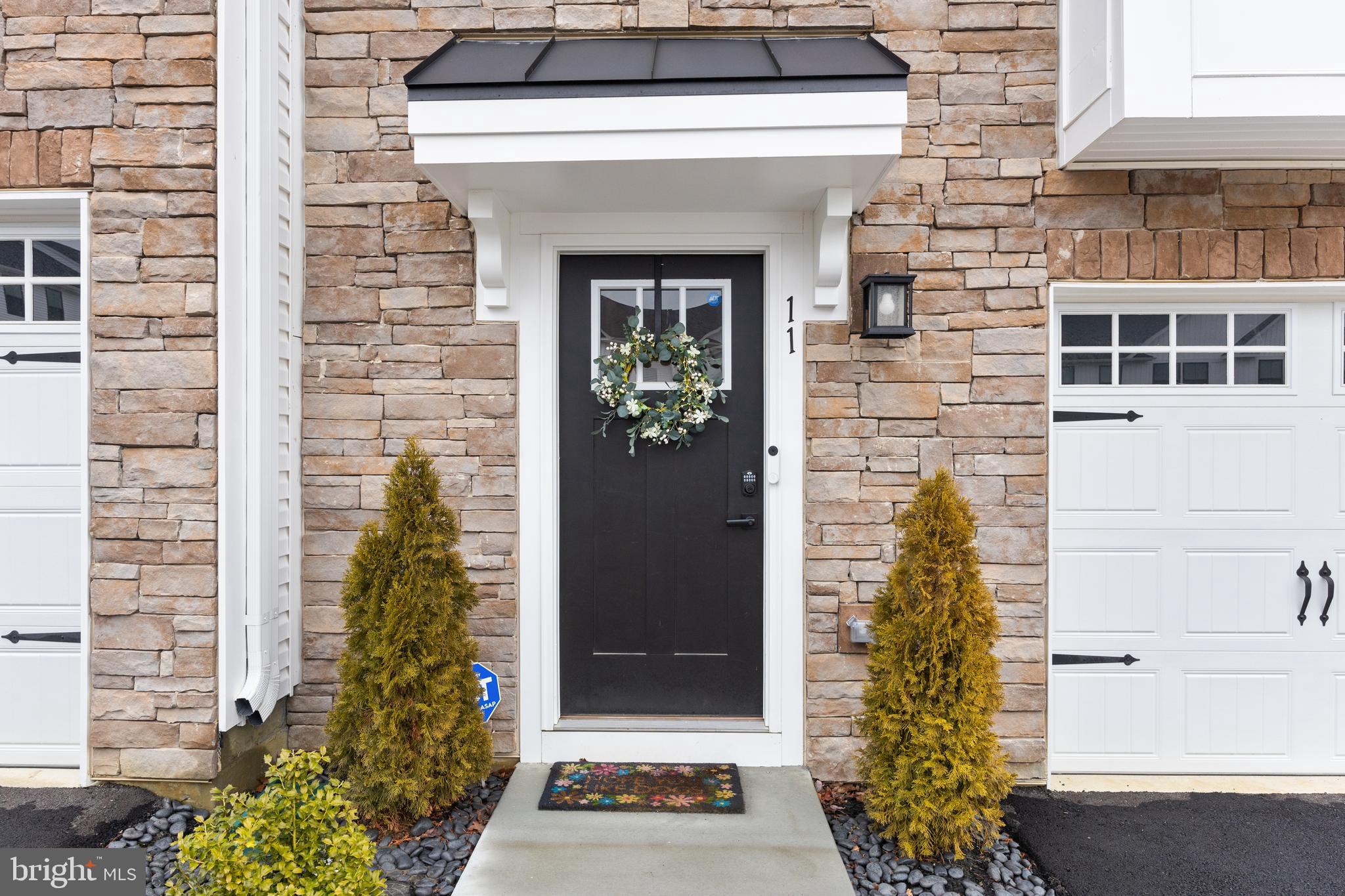 11 Cinnamon Lane Mount Laurel, NJ 08054 - Photo 2 of 17 a front view of a house with a yard