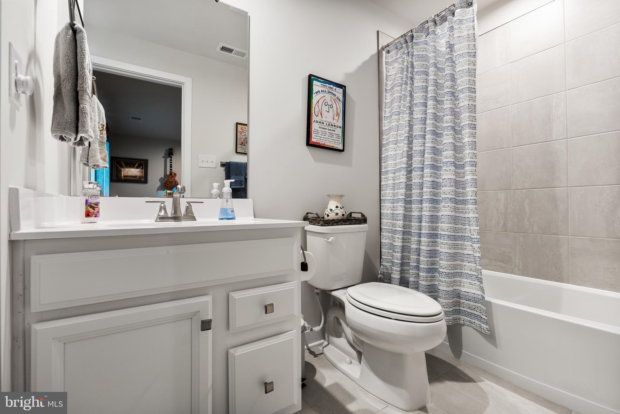 11 Cinnamon Lane Mount Laurel, NJ 08054 - Photo 5 of 17 a bathroom with a sink a toilet and shower