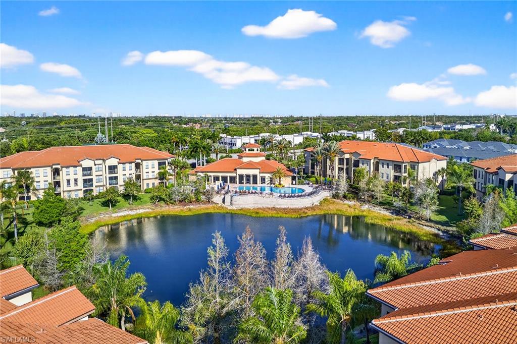12950 Positano Circle, Unit 101 Naples, FL 34105 - Photo 29 of 34 a view of a city with swimming pool