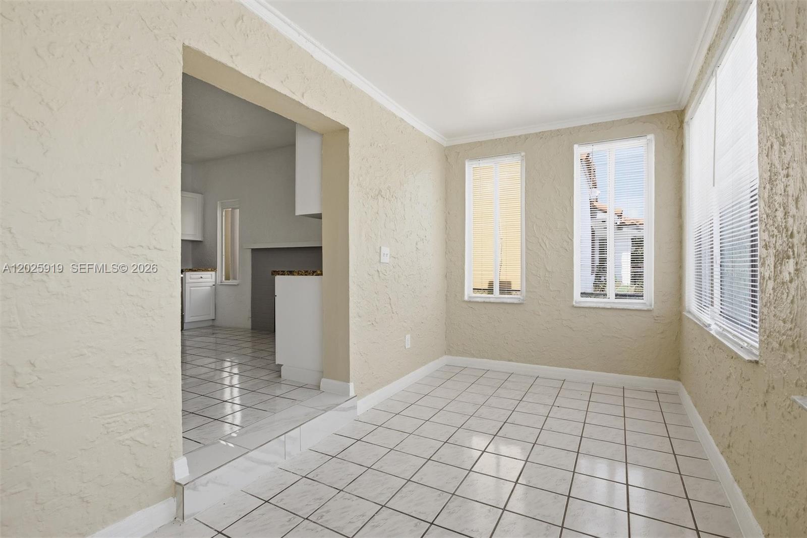 1743 Southwest 17th Street, Unit 1 Miami, FL 33145 - Photo 6 of 32 a view of an empty room and window