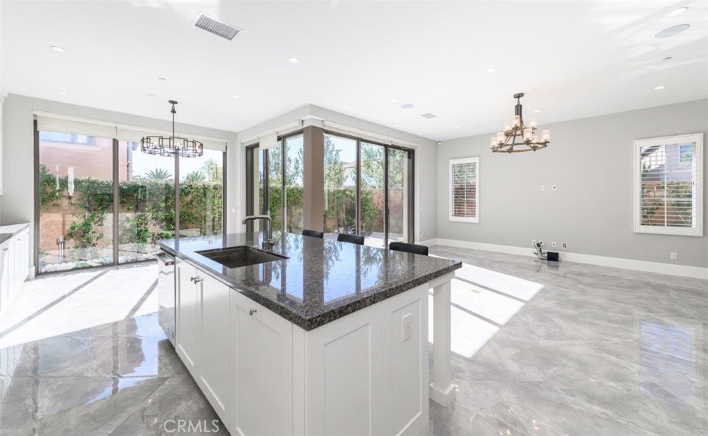 100 Rusina Irvine, CA 92602 - Photo 13 of 46 a very nice looking dining room with a large window