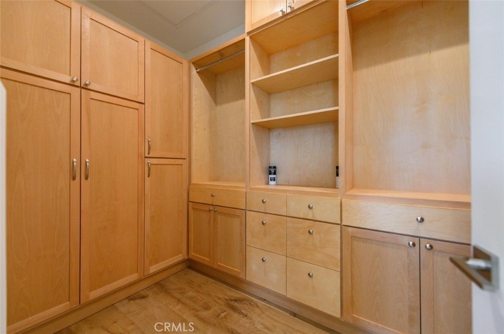 100 Rusina Irvine, CA 92602 - Photo 29 of 46 a room with white cabinets and white doors