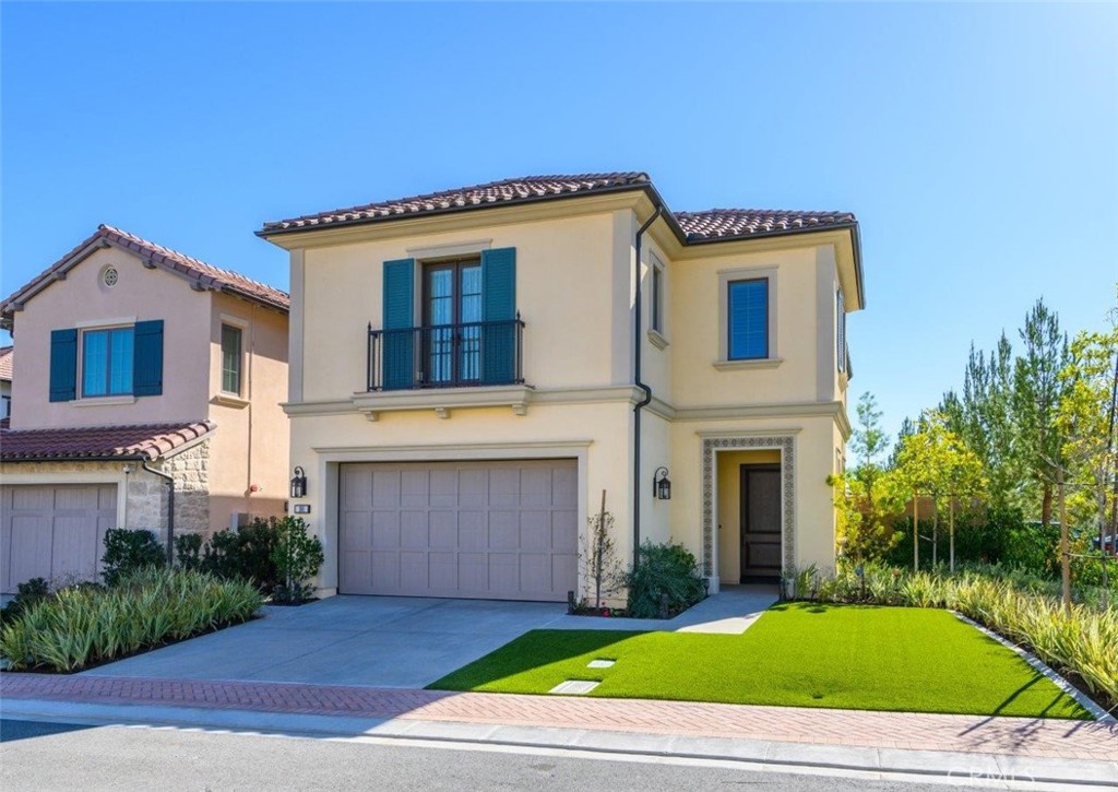 100 Rusina Irvine, CA 92602 - Photo 3 of 46 a view of a house with a yard and a large tree