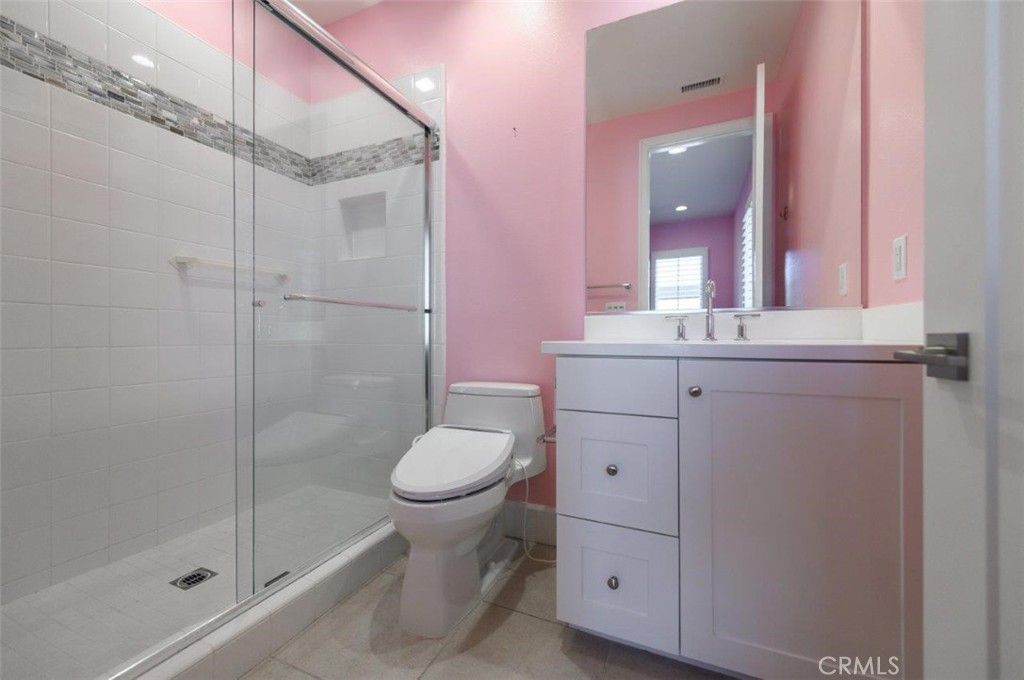 100 Rusina Irvine, CA 92602 - Photo 35 of 46 a bathroom with a sink toilet and shower