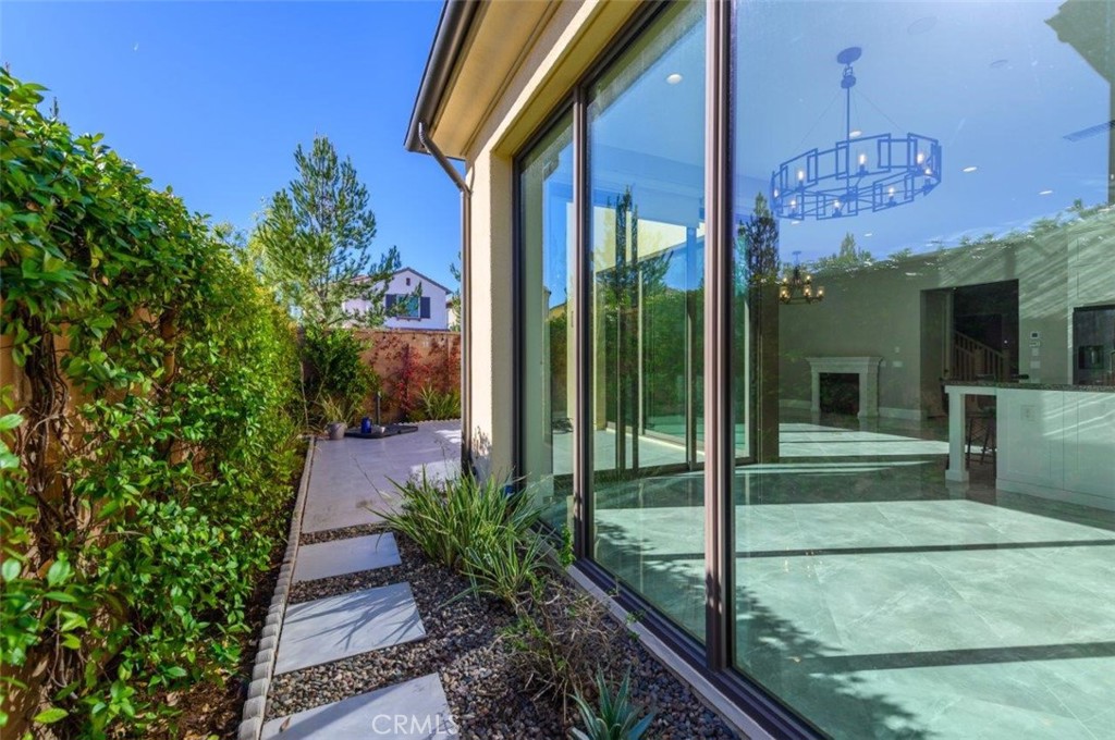 100 Rusina Irvine, CA 92602 - Photo 40 of 46 a view of a porch with a potted plant