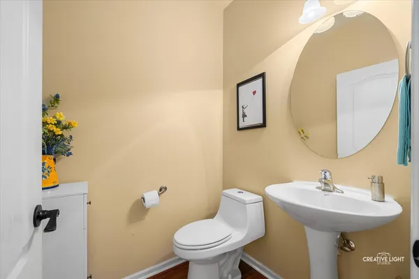 a bathroom with a toilet and a sink