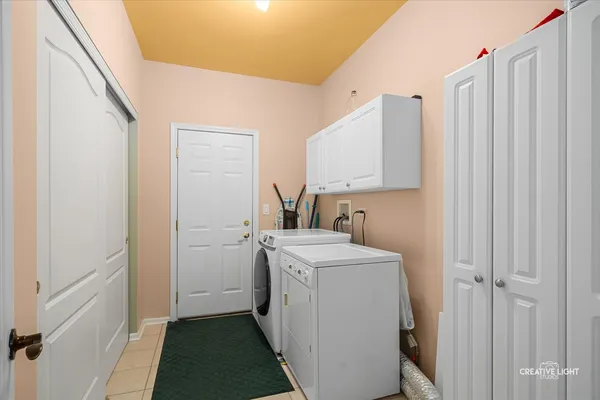 a view of a storage & utility room with a sink