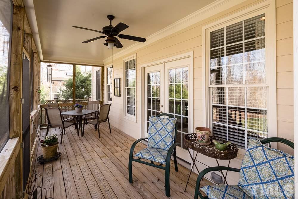 5109 Indigo Moon Way Raleigh, NC 27613 - Photo 21 of 24 a view of a livingroom with furniture and floor to ceiling window