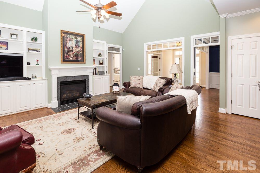 5109 Indigo Moon Way Raleigh, NC 27613 - Photo 7 of 24 a living room with furniture and a fireplace