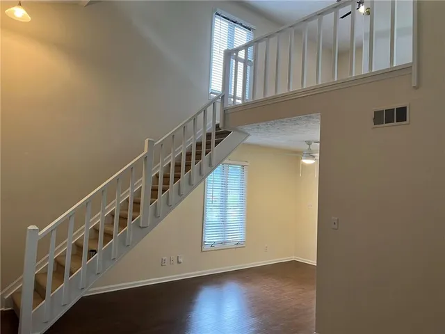 a view of entryway with wooden floor