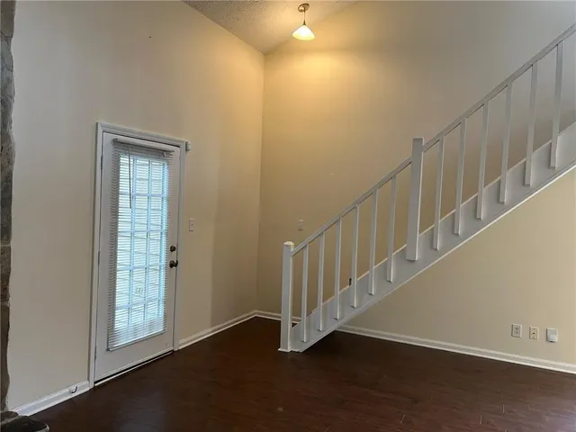 a view of entryway with wooden floor
