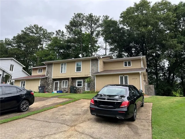 a car parked in front of a house