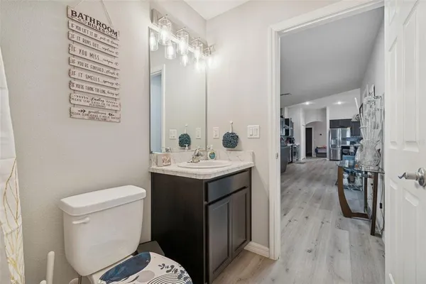 a view of backyard with large tree