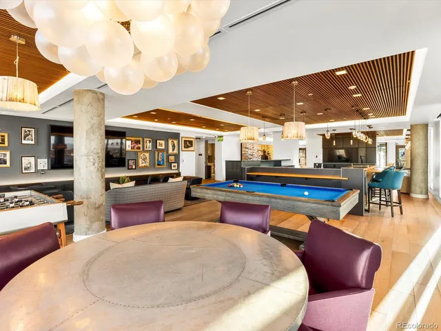 a living room with furniture and window