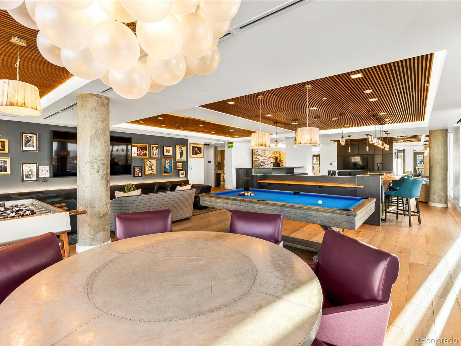 1750 Wewatta Street, Unit 1409 Denver, CO 80202 - Photo 32 of 48 a swimming pool with outdoor seating and yard