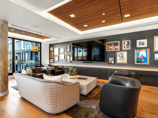 a kitchen with stainless steel appliances granite countertop a sink a stove and cabinets