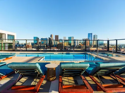 a view of swimming pool from a balcony