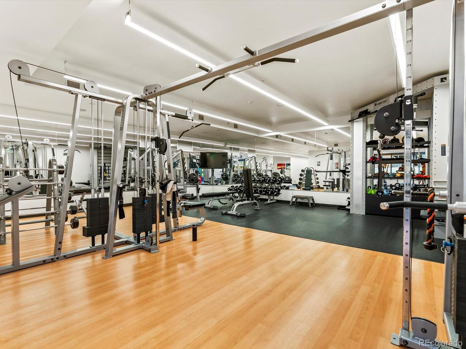 1750 Wewatta Street, Unit 1409 Denver, CO 80202 - Photo 41 of 48 a view of a room with gym equipment