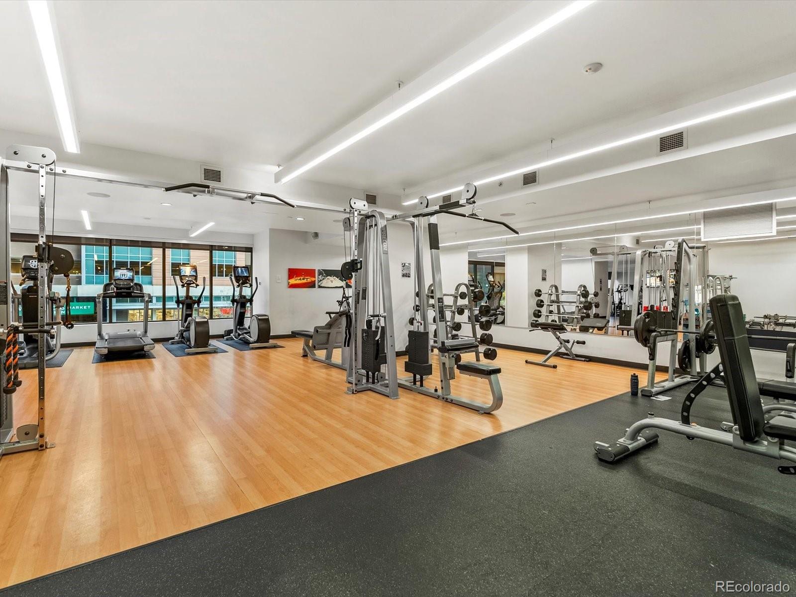 1750 Wewatta Street, Unit 1409 Denver, CO 80202 - Photo 42 of 48 a view of a room with gym equipment