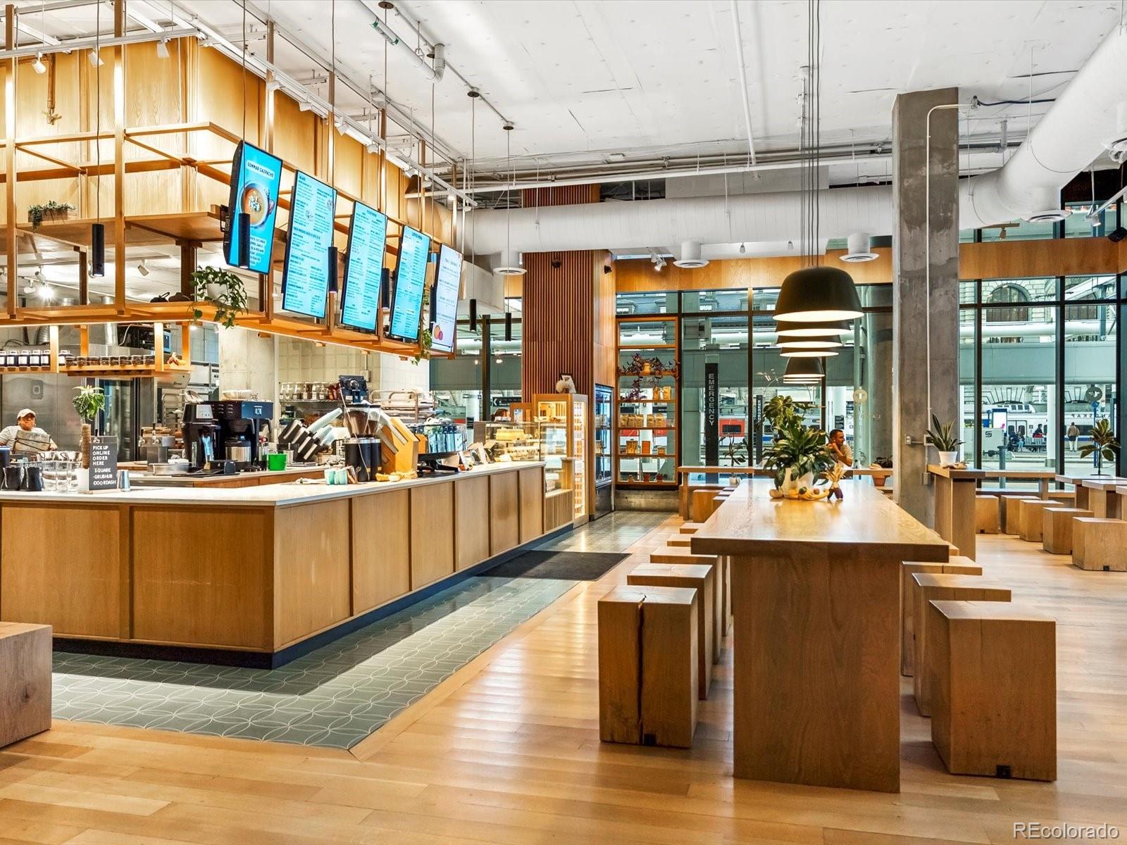 1750 Wewatta Street, Unit 1409 Denver, CO 80202 - Photo 43 of 48 a view of a living room with a wooden floor