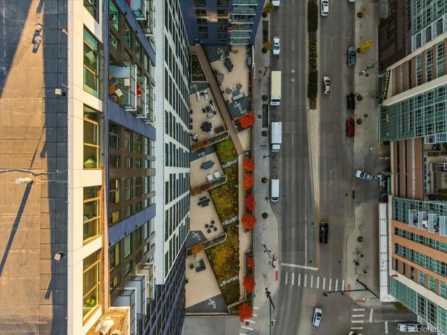 an aerial view of a city with lots of residential buildings
