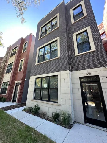 a building view with a garden space