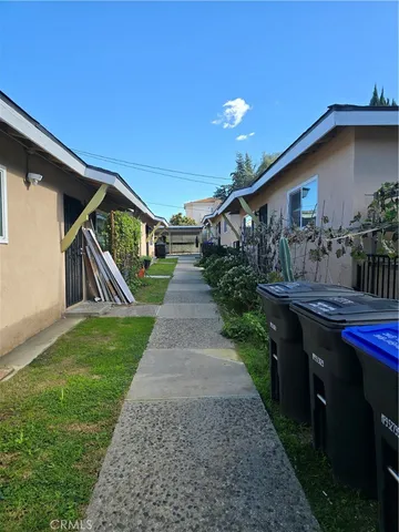 a front view of house along with green space