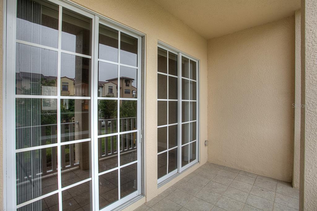 6021 Printery Street, Unit 106 Tampa, FL 33616 - Photo 12 of 23 a view of an empty room with a window