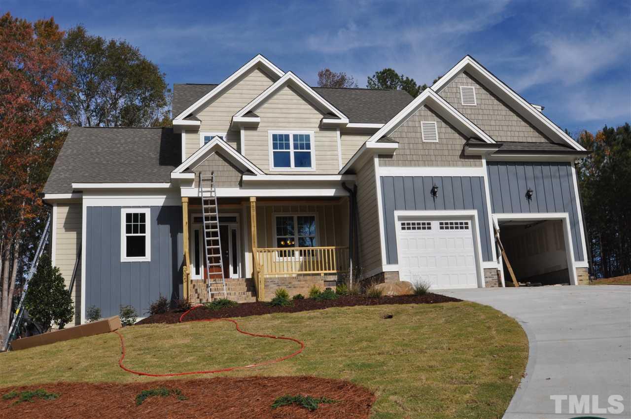 2025 Sageleaf Court Raleigh, NC 27603 - Photo 1 of 14 a front view of a house with a yard