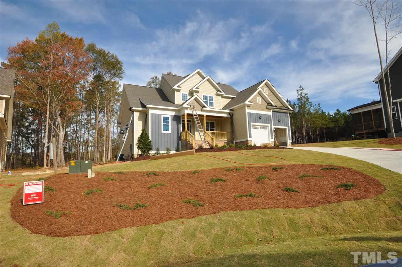 2025 Sageleaf Court Raleigh, NC 27603 - Photo 2 of 14 a front view of a house with a yard