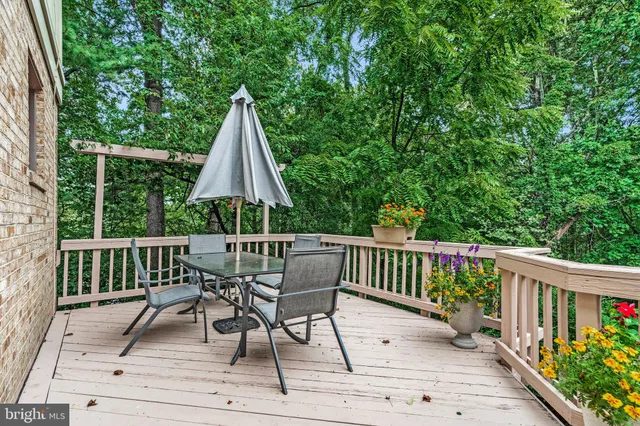 a kitchen with wooden cabinets and a stove