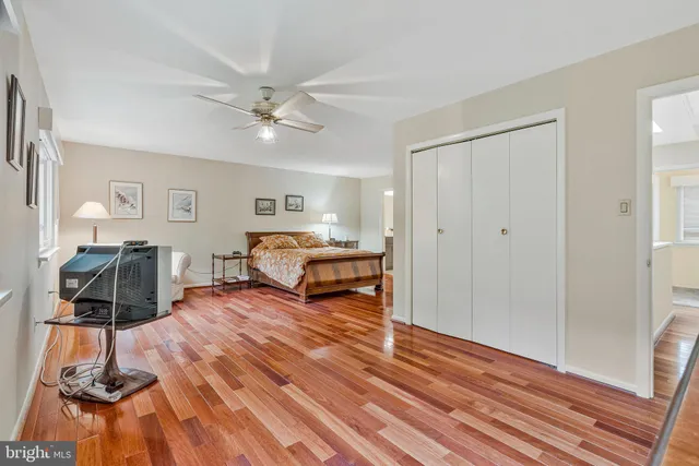 a bathroom with a glass shower door