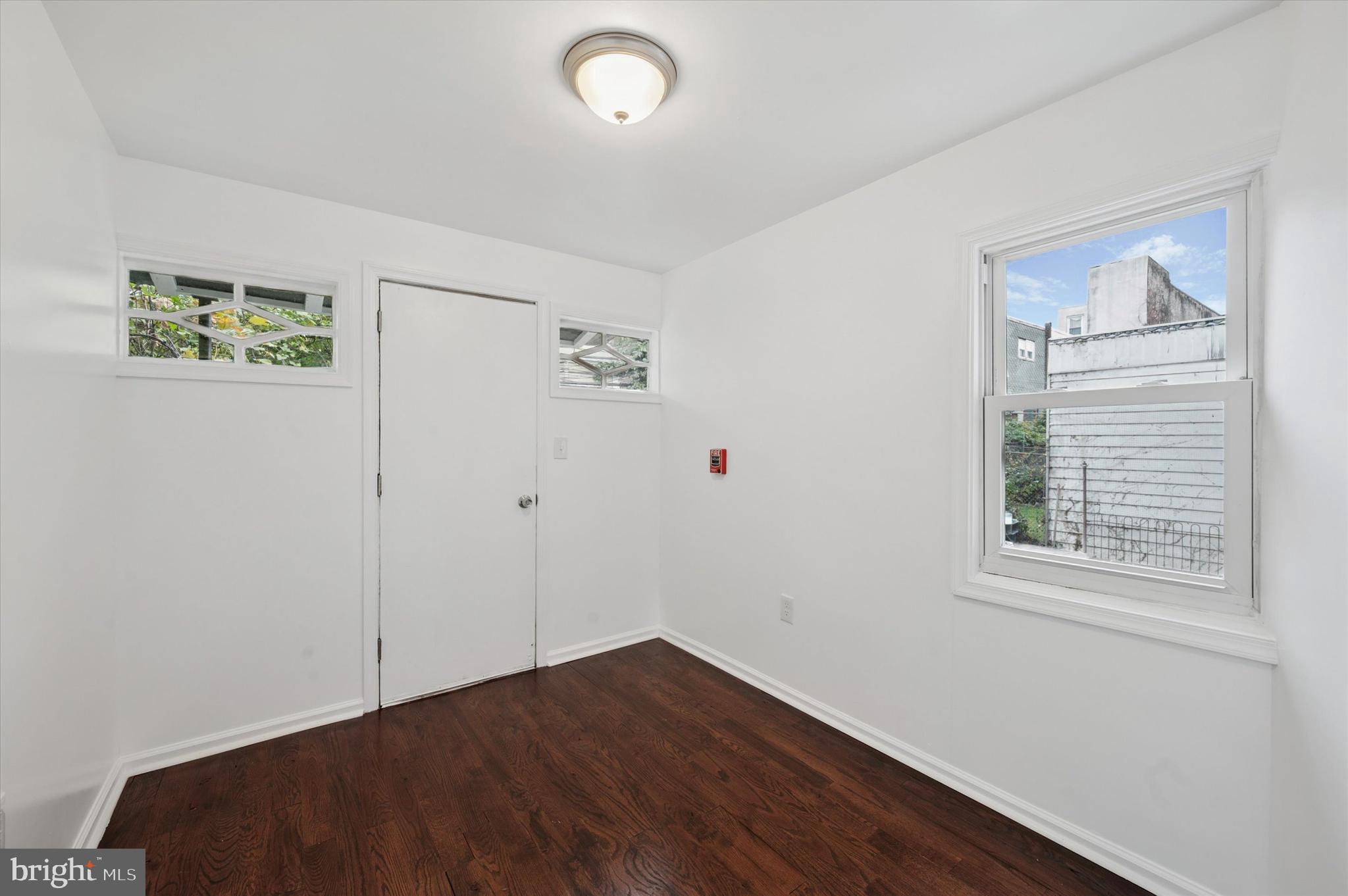 4928 Walnut Street, Unit 1 Philadelphia, PA 19139 - Photo 5 of 7 a view of an empty room with a window