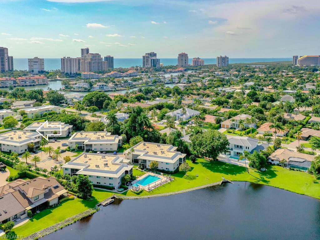 4180 Crayton Road, Unit E7 Naples, FL 34103 - Photo 28 of 35 a view of a city