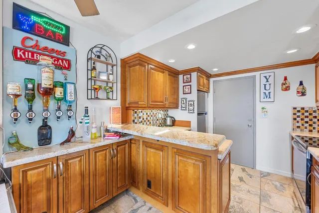 a bathroom with a sink a mirror and a shower