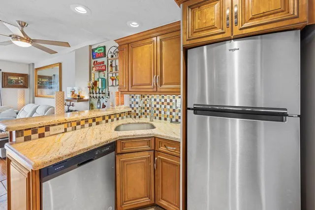 a kitchen with a stove and a microwave