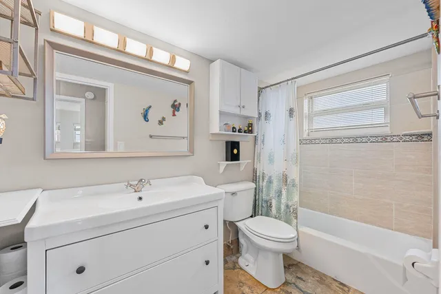 a sign that is on the side of a building