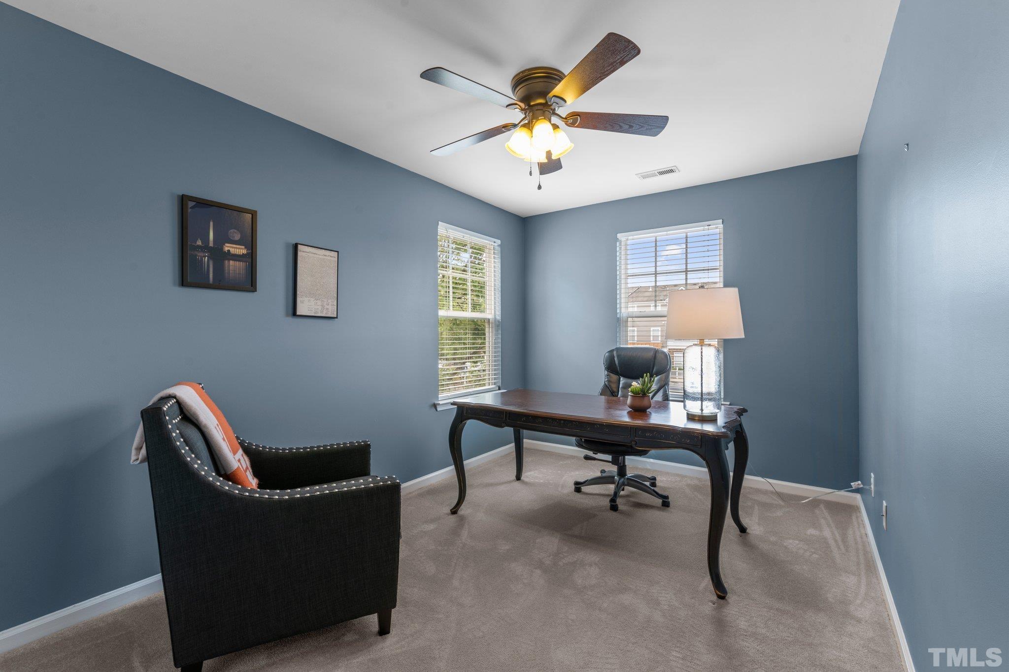 11720 Coppergate Drive, Unit 100 Raleigh, NC 27614 - Photo 14 of 22 a work room with furniture and a window