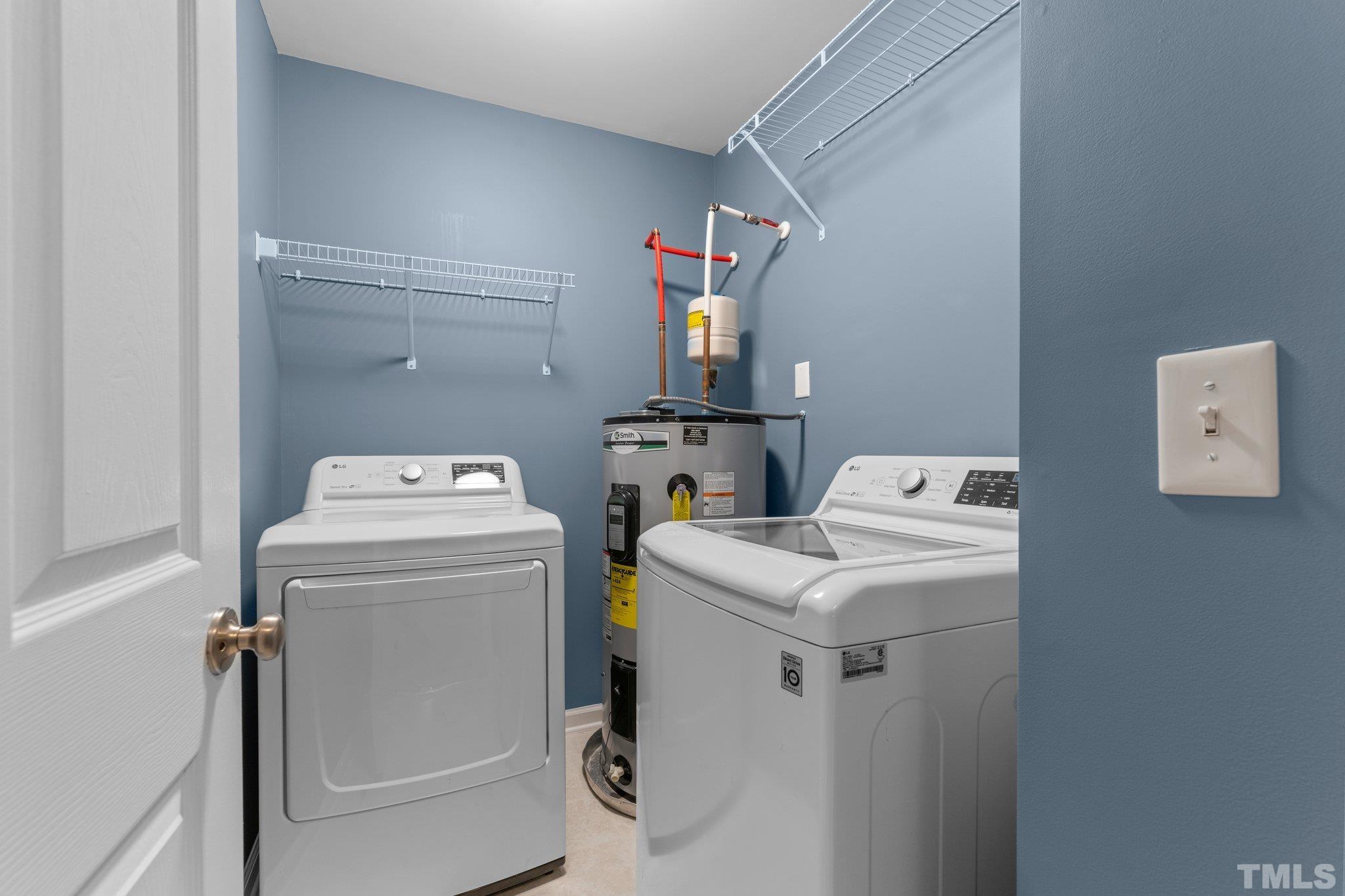 11720 Coppergate Drive, Unit 100 Raleigh, NC 27614 - Photo 17 of 22 a utility room with dryer and washer