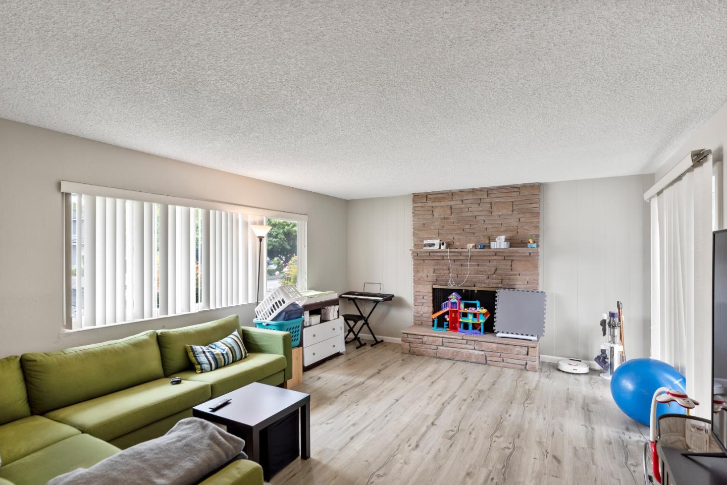 1010 Williams Way Mountain View, CA 94040 - Photo 2 of 26 a living room with furniture and a flat screen tv