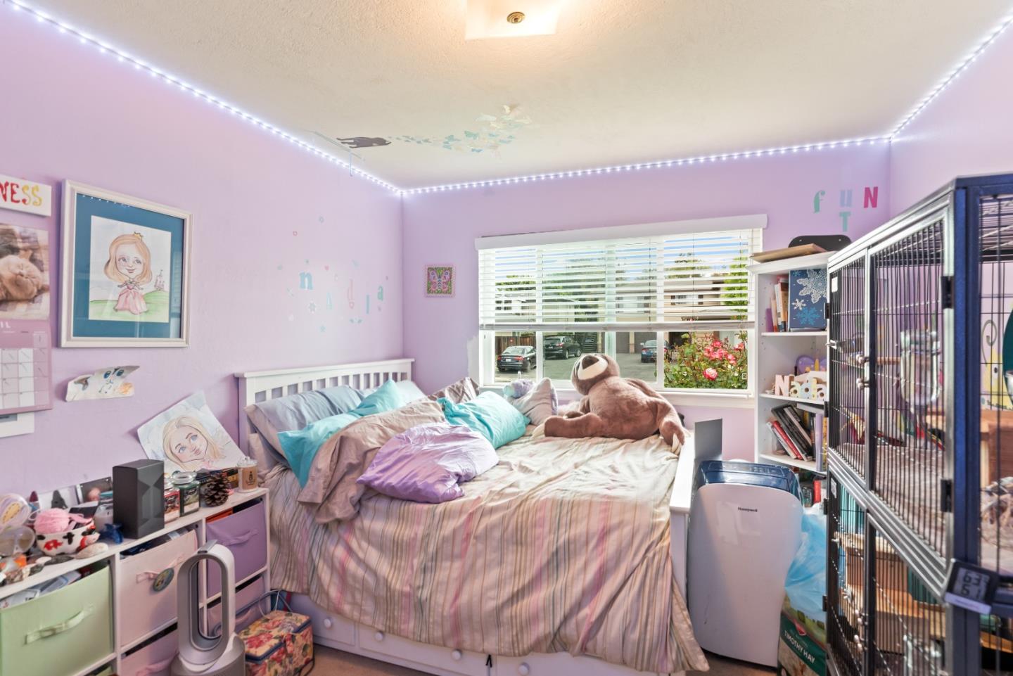 1010 Williams Way Mountain View, CA 94040 - Photo 24 of 26 a bed room with a bed and a large window