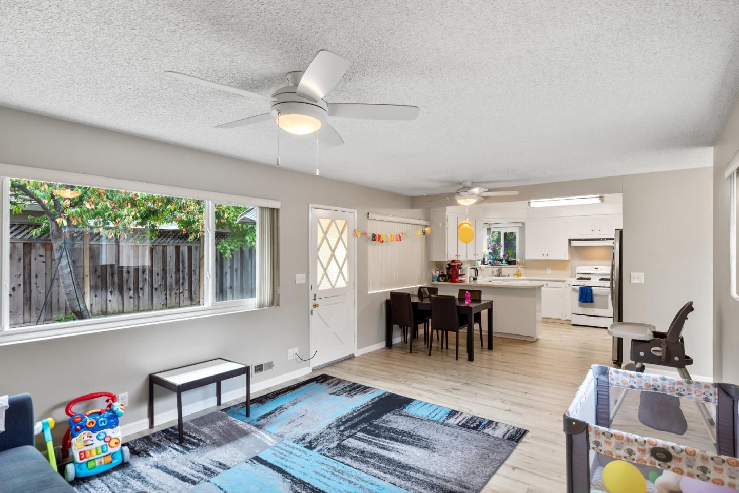 1010 Williams Way Mountain View, CA 94040 - Photo 4 of 26 a living room with furniture and a wooden floor