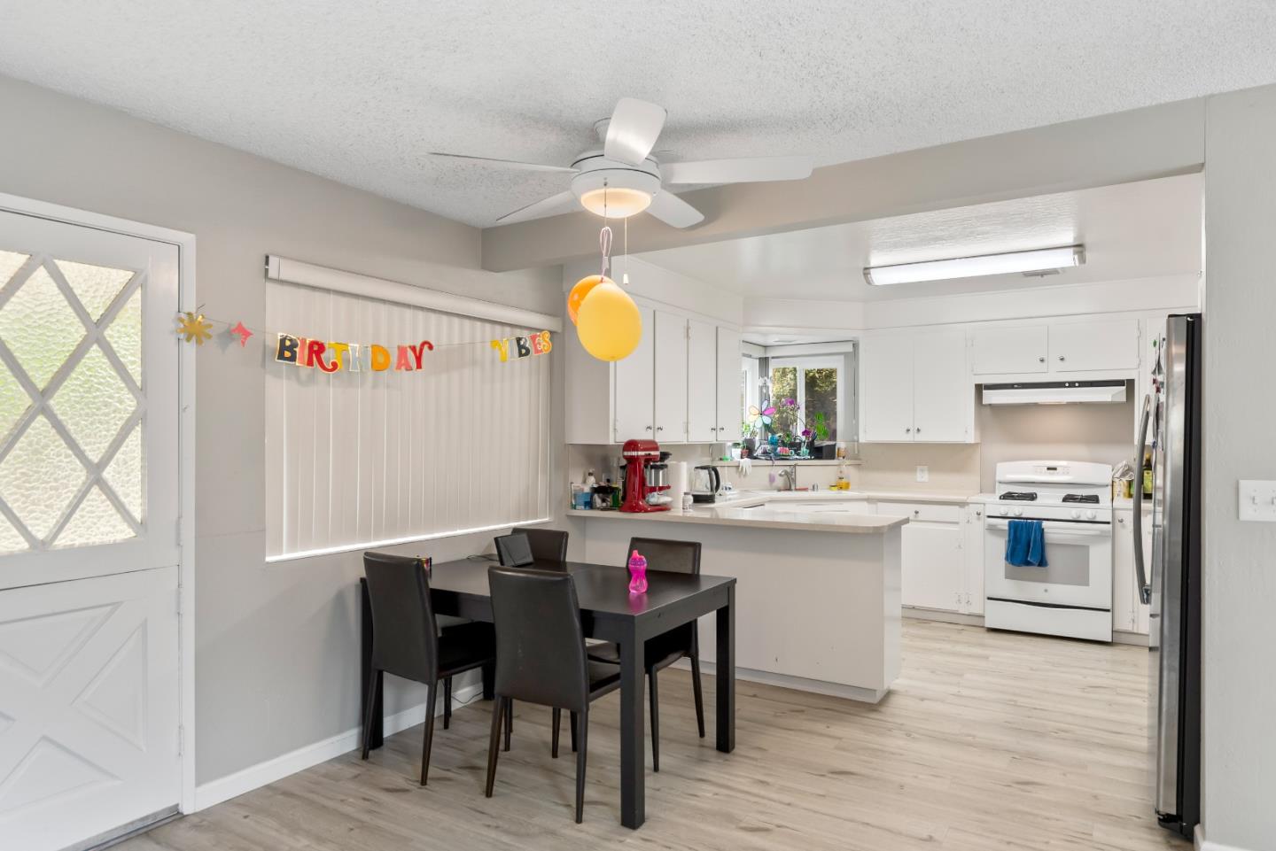 1010 Williams Way Mountain View, CA 94040 - Photo 6 of 26 a kitchen with a cabinets and chairs