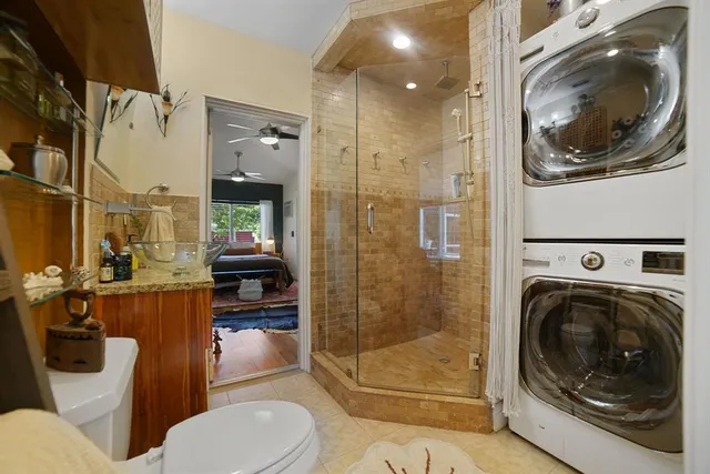 an aerial view of residential houses with outdoor space