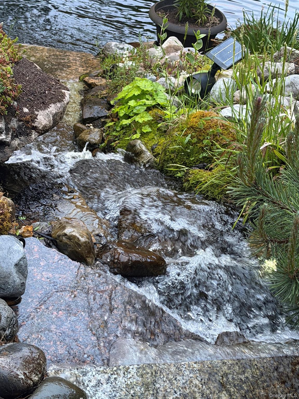 16 Gregory Road Monticello, NY 12701 - Photo 16 of 42 waterfall at koi pond