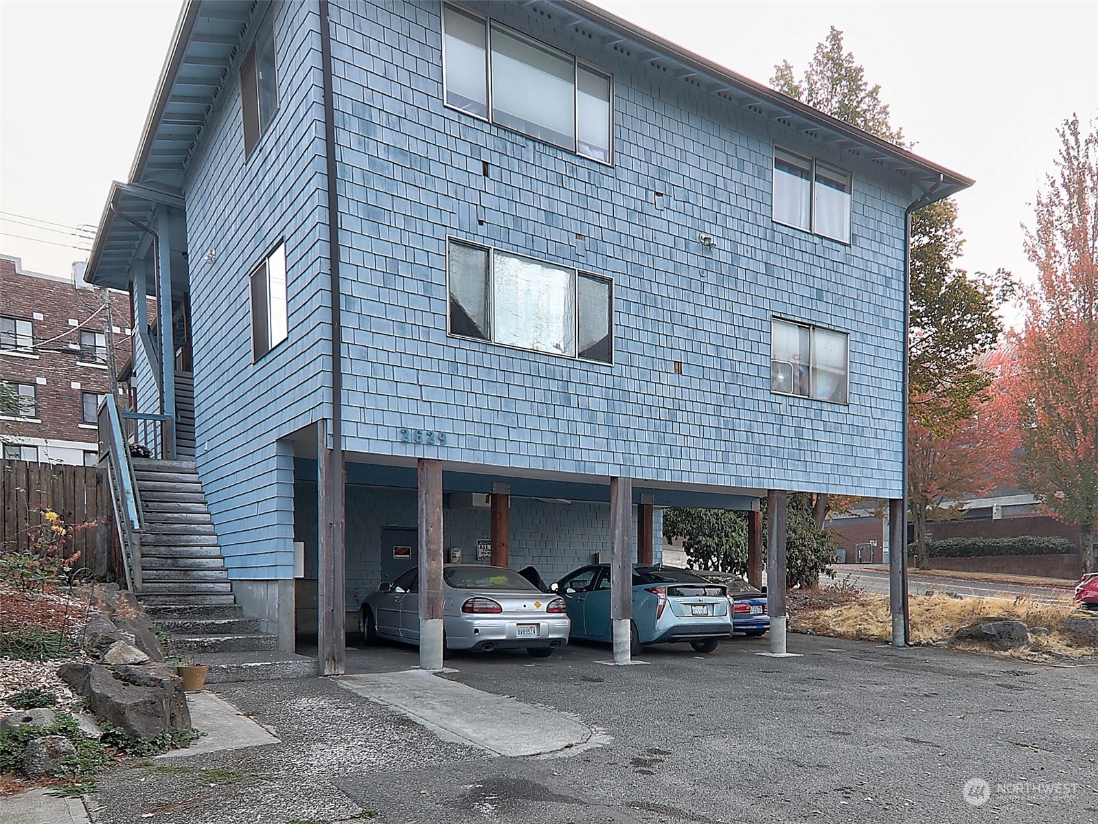 2629 Rucker Avenue, Unit 6 Everett, WA 98201 - Photo 1 of 14 a view of a car park front of a house