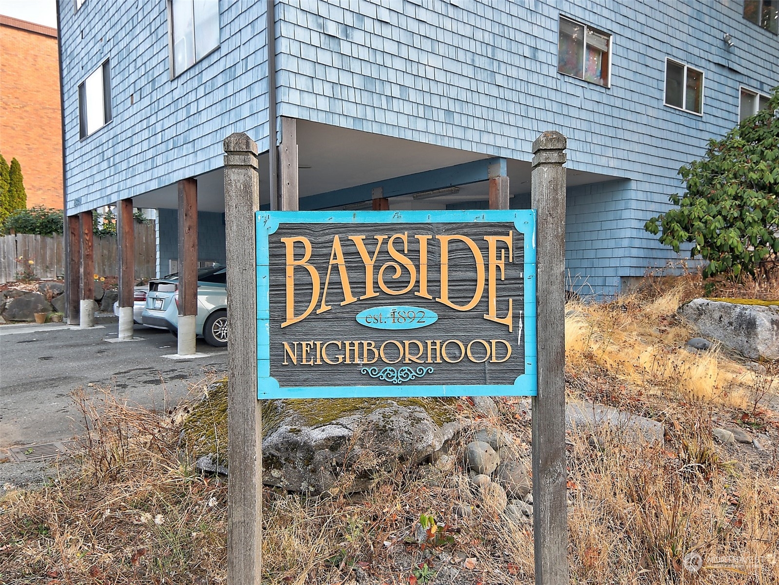 2629 Rucker Avenue, Unit 6 Everett, WA 98201 - Photo 2 of 14 a sign broad on the side of a brick building